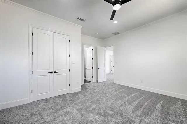 a bathroom with a shower toilet and sink