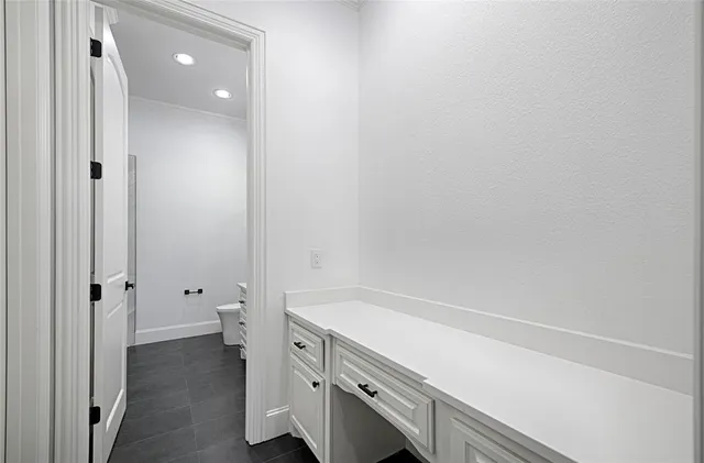 a bathroom with a sink toilet tub and shower