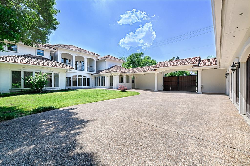 6301 Churchill Way Dallas, TX 75230 - Photo 38 of 40 a view of house with yard and green space