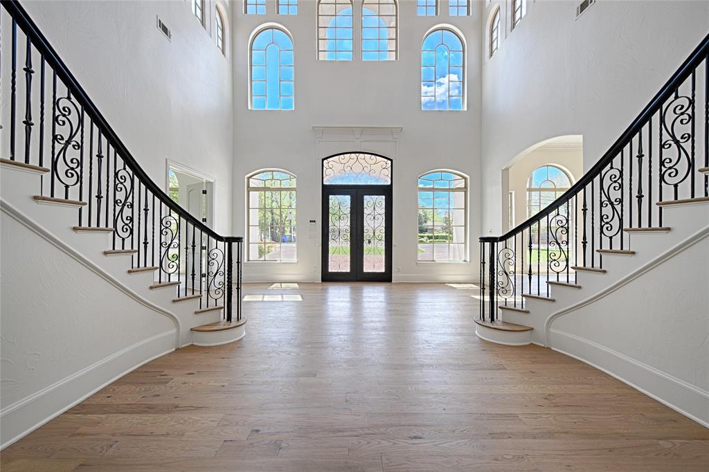 6301 Churchill Way Dallas, TX 75230 - Photo 4 of 40 a view of entryway and hall with wooden floor