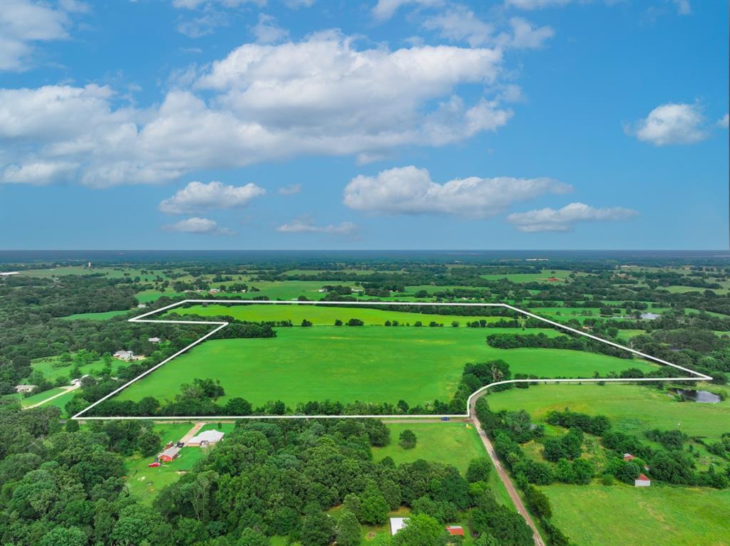 3 County Road 1726 Yantis, TX 75497 - Photo 8 of 11 a view of a field with a big yard