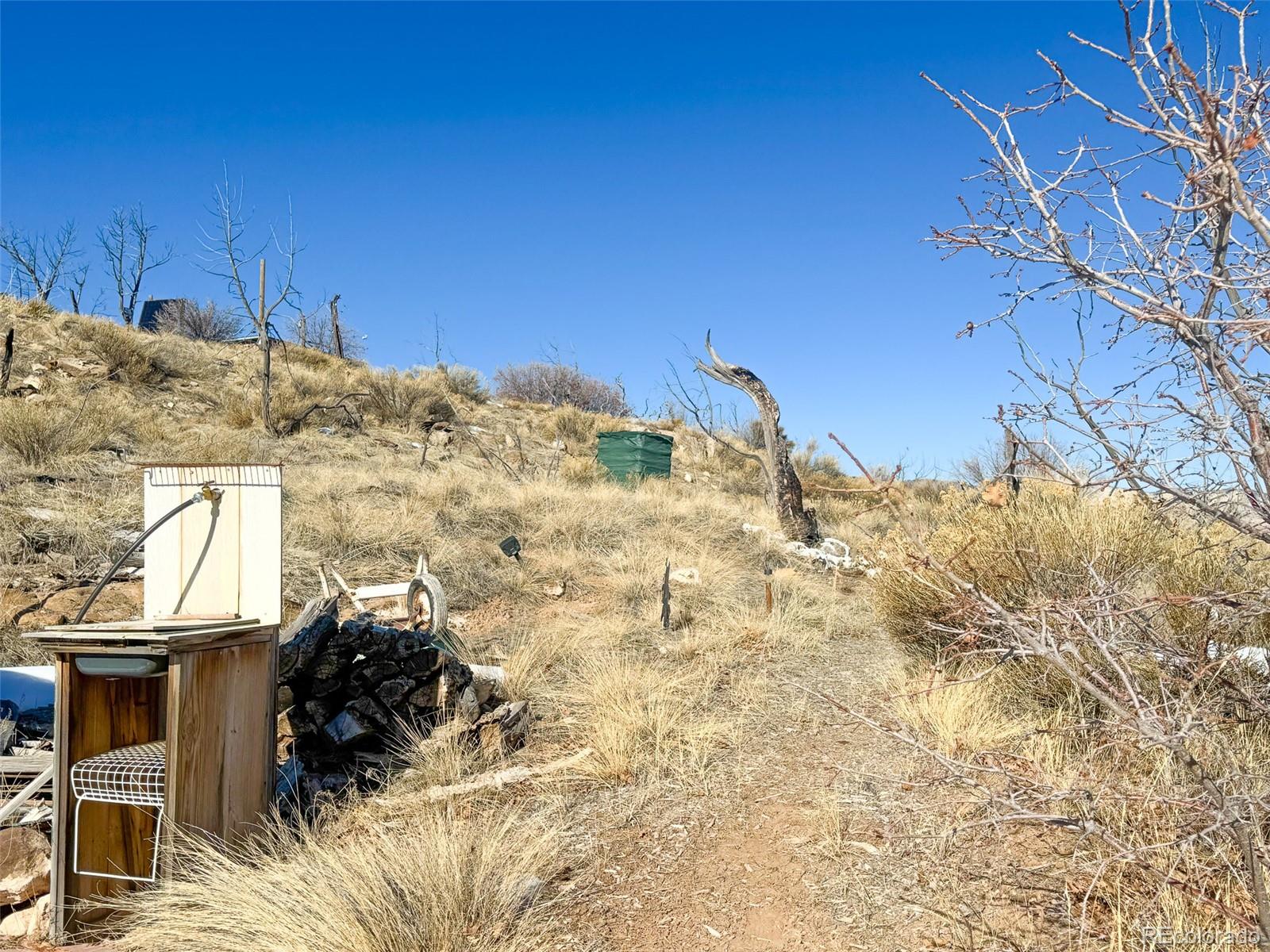 1725 35 1/10 Road De Beque, CO 81630 - Photo 11 of 36 a view of a backyard of the house
