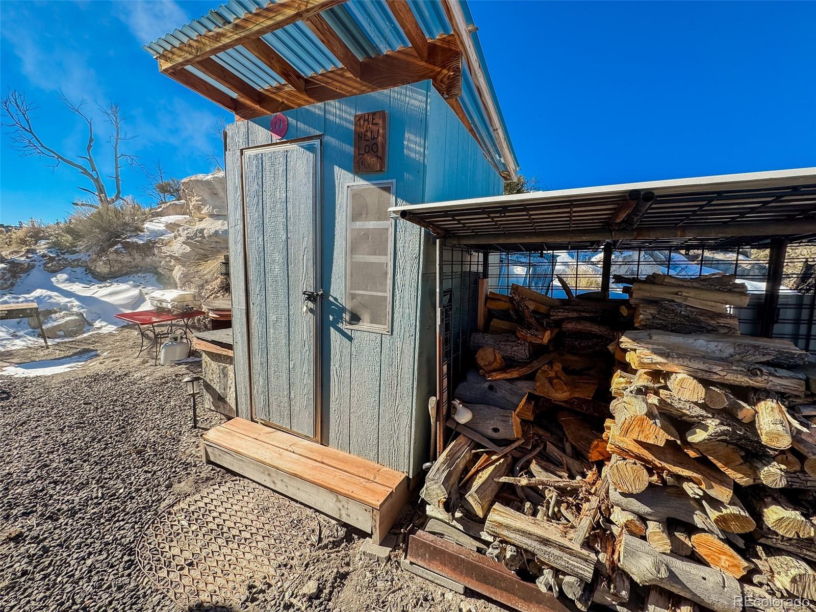 1725 35 1/10 Road De Beque, CO 81630 - Photo 12 of 36 a view of entryway with wooden walls