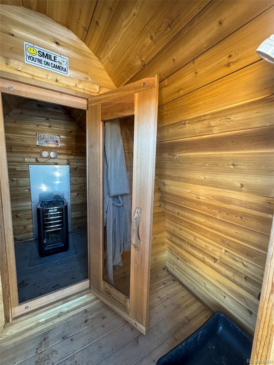 1725 35 1/10 Road De Beque, CO 81630 - Photo 14 of 36 a view of a hallway with wooden floor