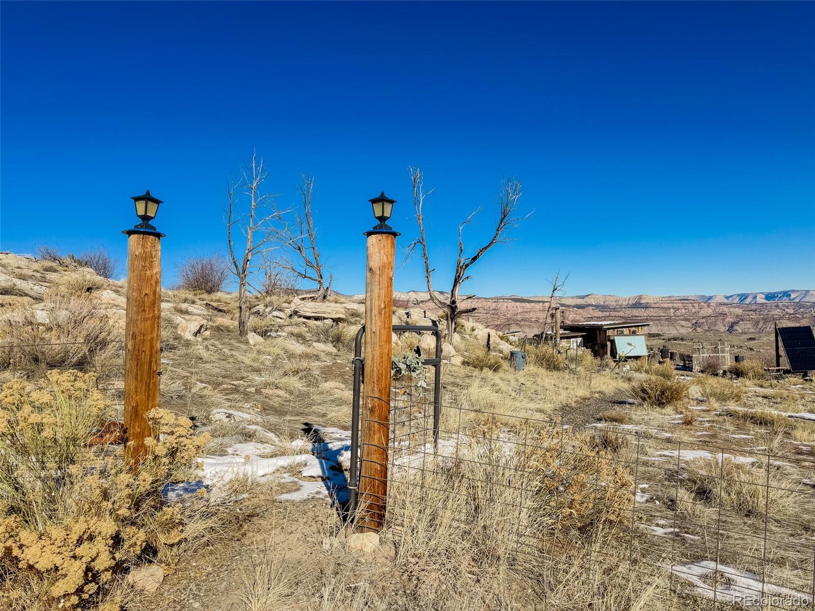1725 35 1/10 Road De Beque, CO 81630 - Photo 16 of 36 a view of a glass door