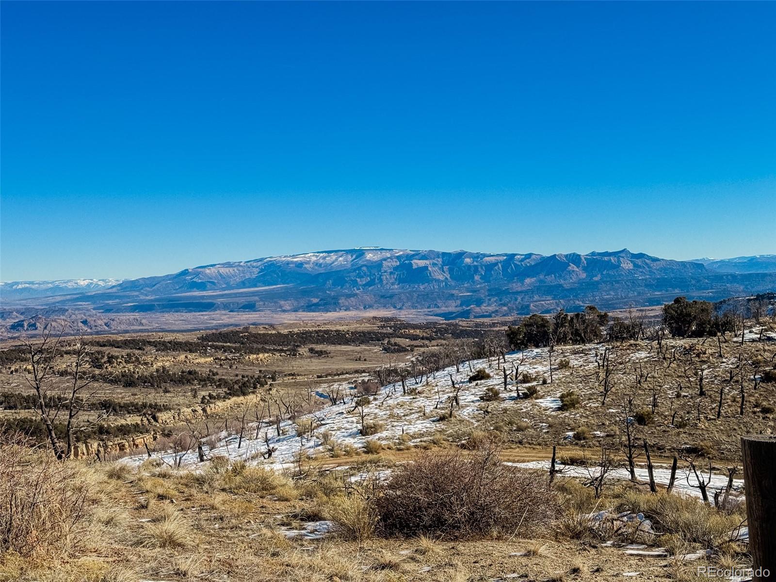 1725 35 1/10 Road De Beque, CO 81630 - Photo 22 of 36 a view of lake and mountain