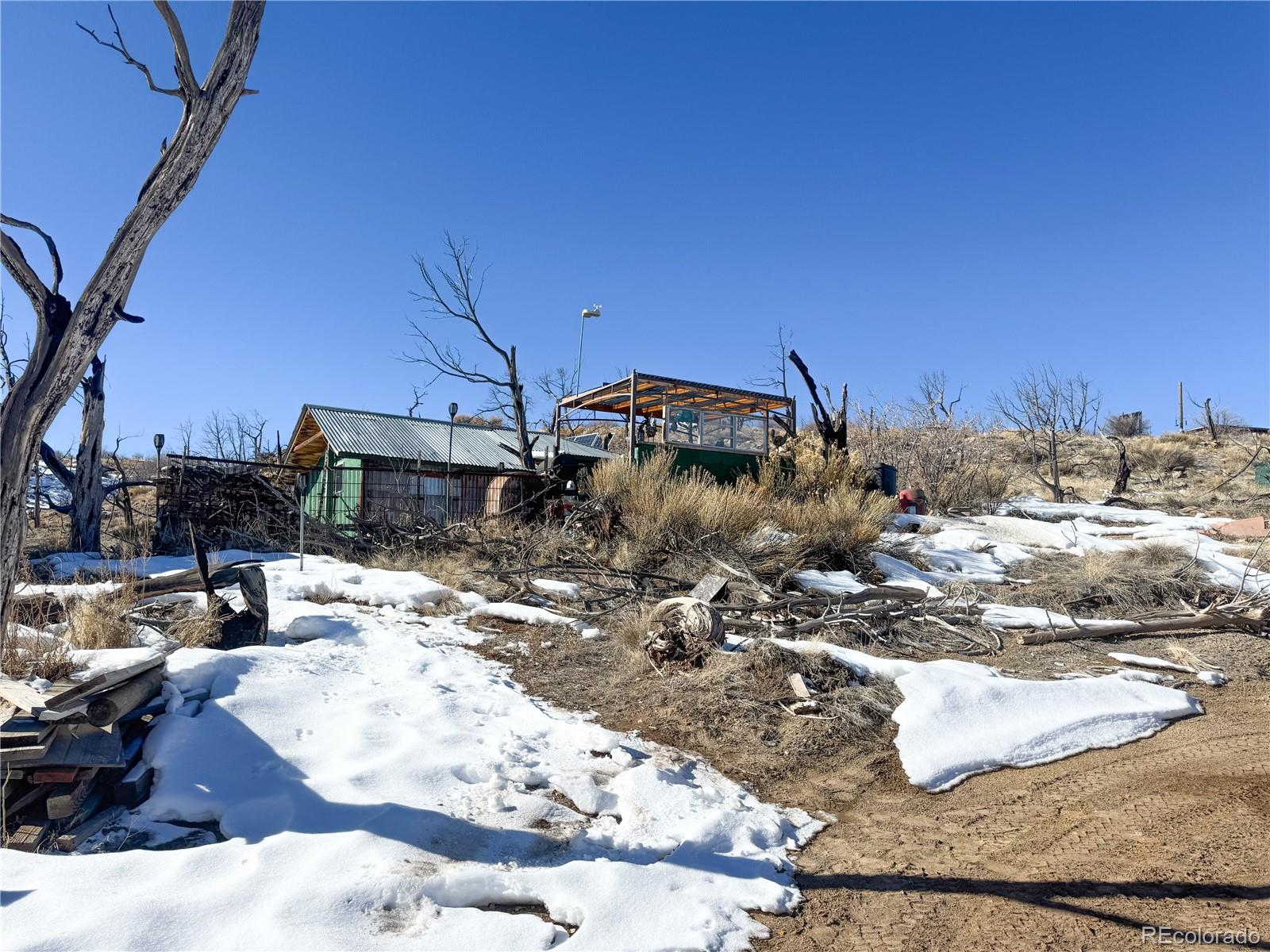 1725 35 1/10 Road De Beque, CO 81630 - Photo 23 of 36 a view of a backyard of the house