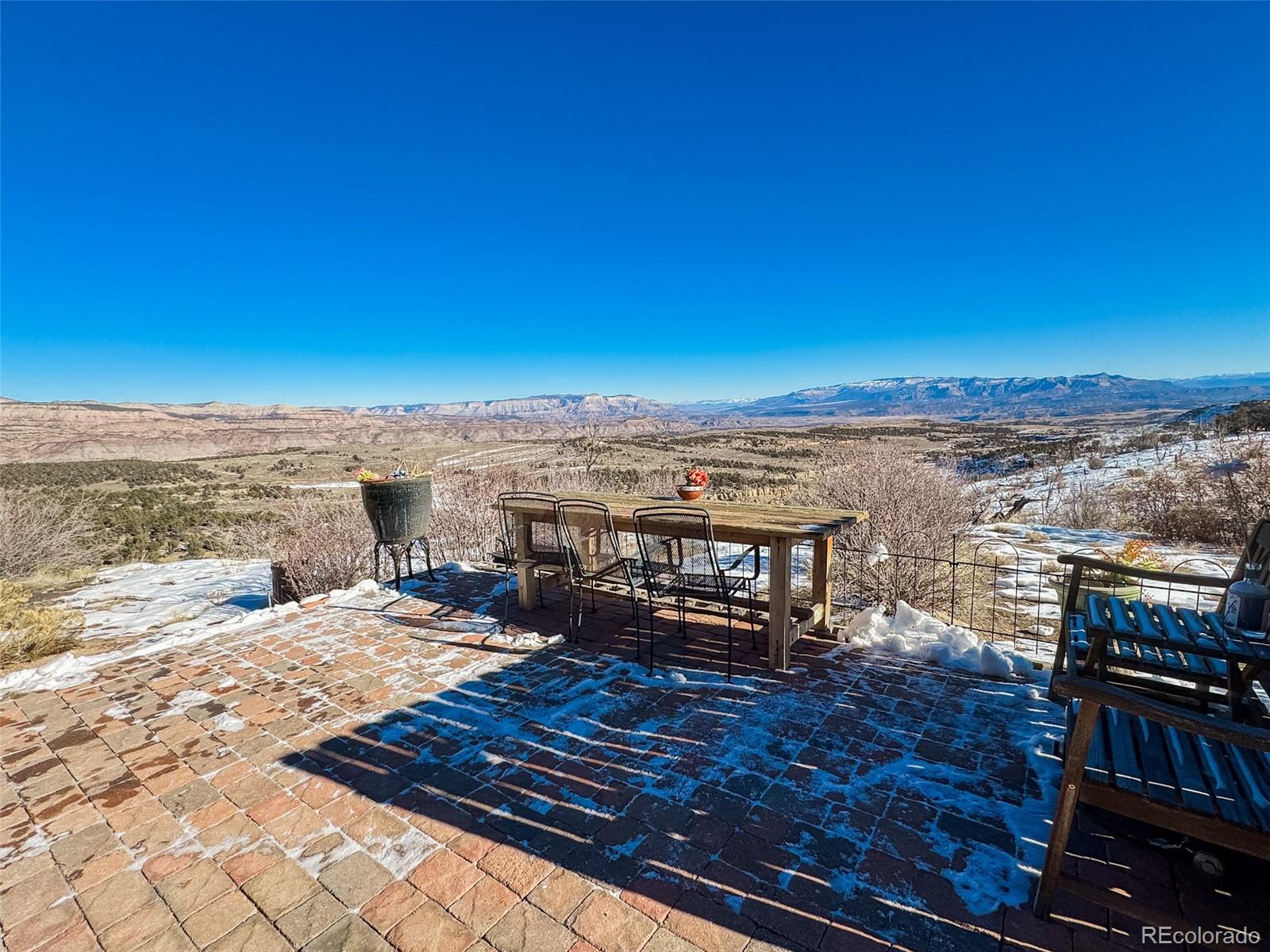 1725 35 1/10 Road De Beque, CO 81630 - Photo 31 of 36 a view of a balcony with an ocean view