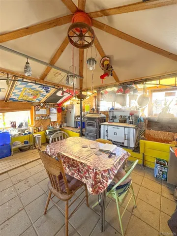 a view of a house with a tree