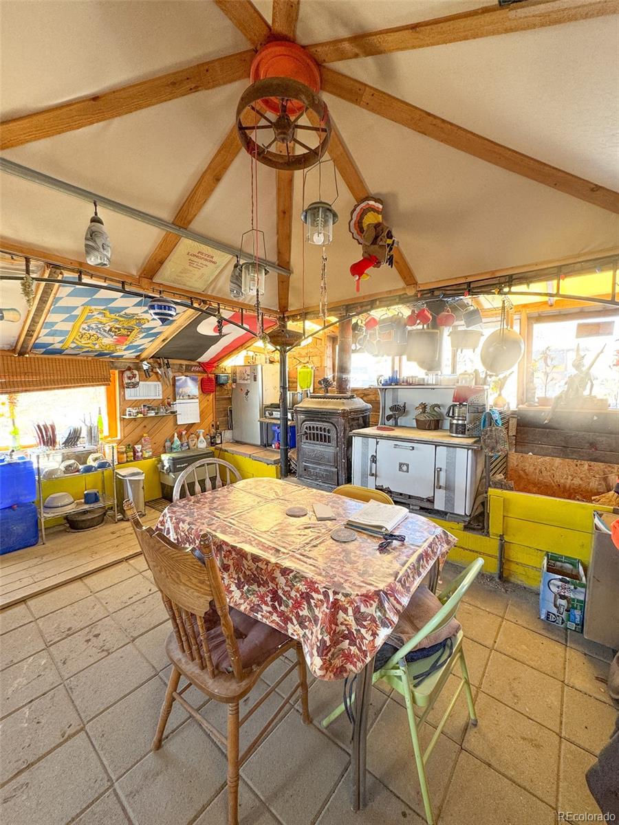1725 35 1/10 Road De Beque, CO 81630 - Photo 6 of 36 a view of a chairs and table in a patio
