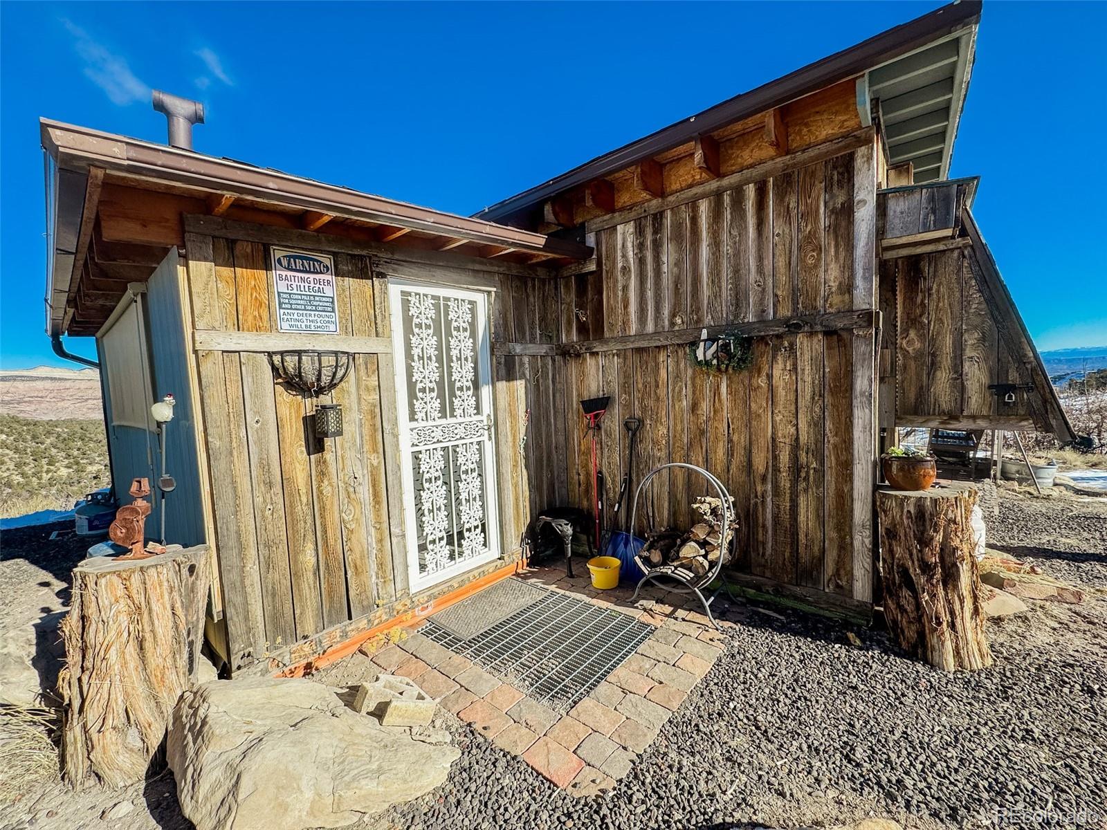 1725 35 1/10 Road De Beque, CO 81630 - Photo 9 of 36 a front view of a house