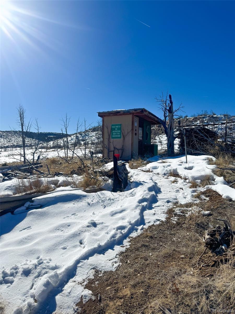 1725 35 1/10 Road De Beque, CO 81630 - Photo 9 of 36 a view of a house with snow on the road