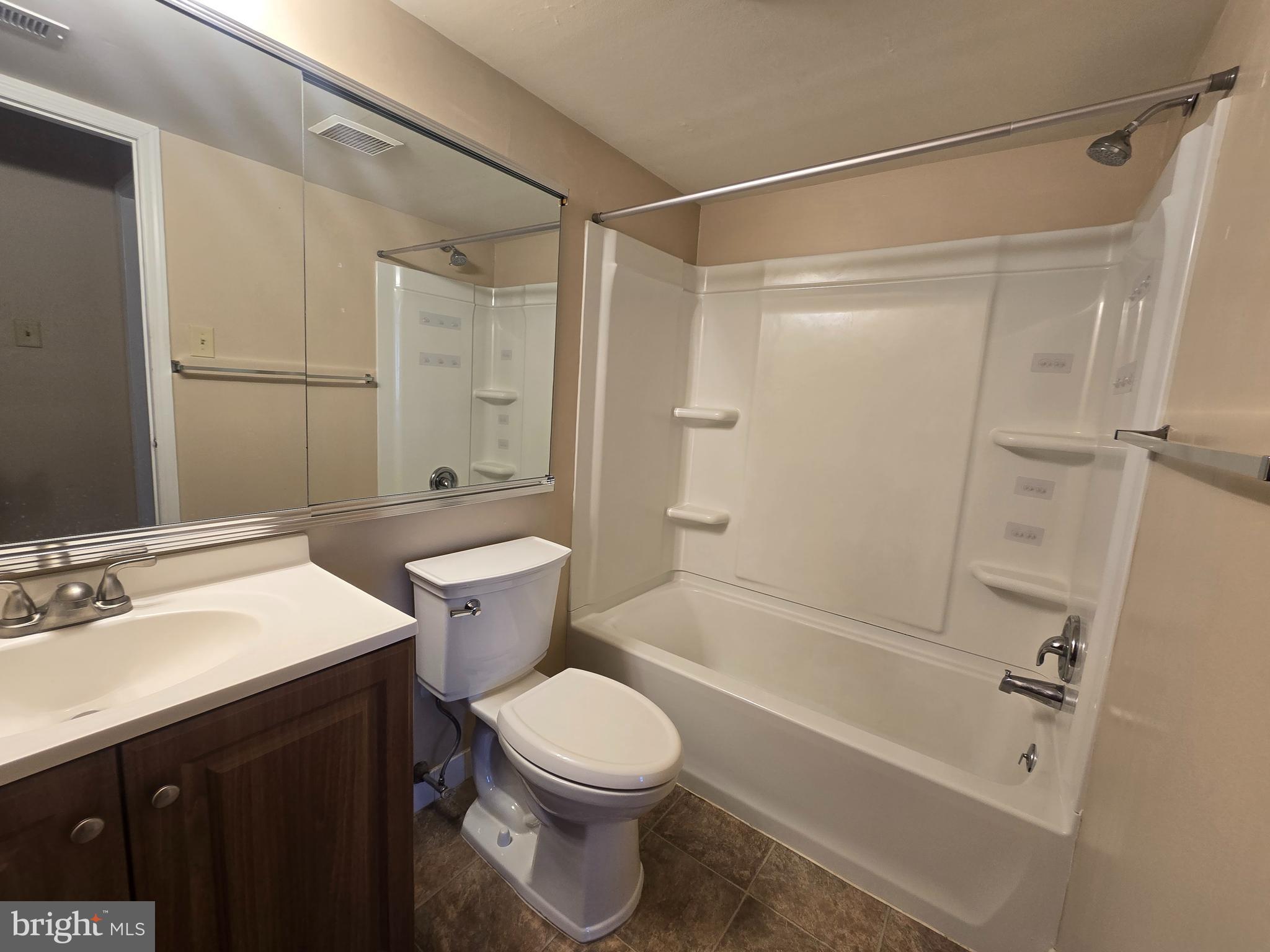 1769 North Dove Road, Unit A Yardley, PA 19067 - Photo 11 of 13 a bathroom with a sink toilet and shower