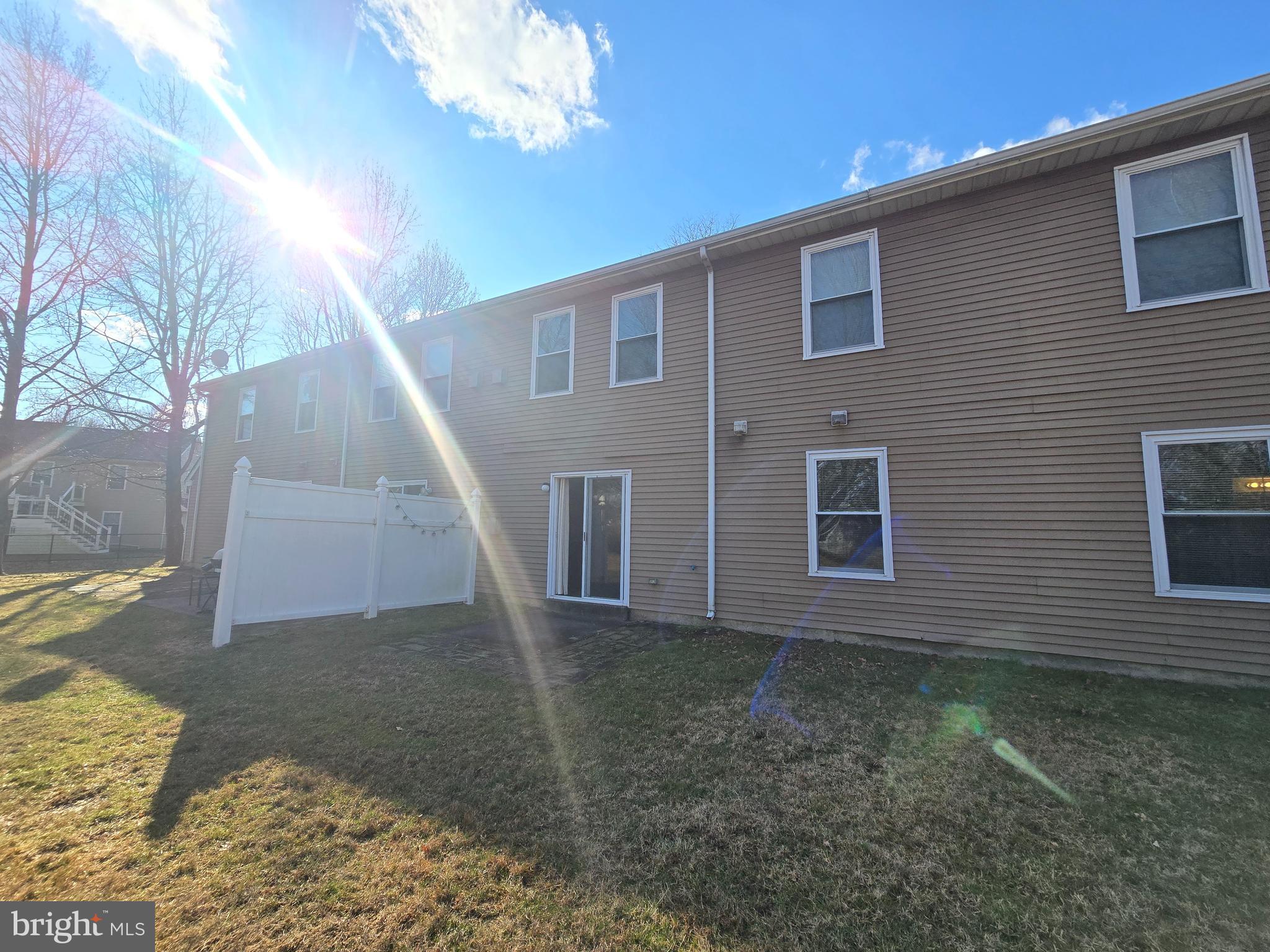 1769 North Dove Road, Unit A Yardley, PA 19067 - Photo 13 of 13 a view of a house with a yard