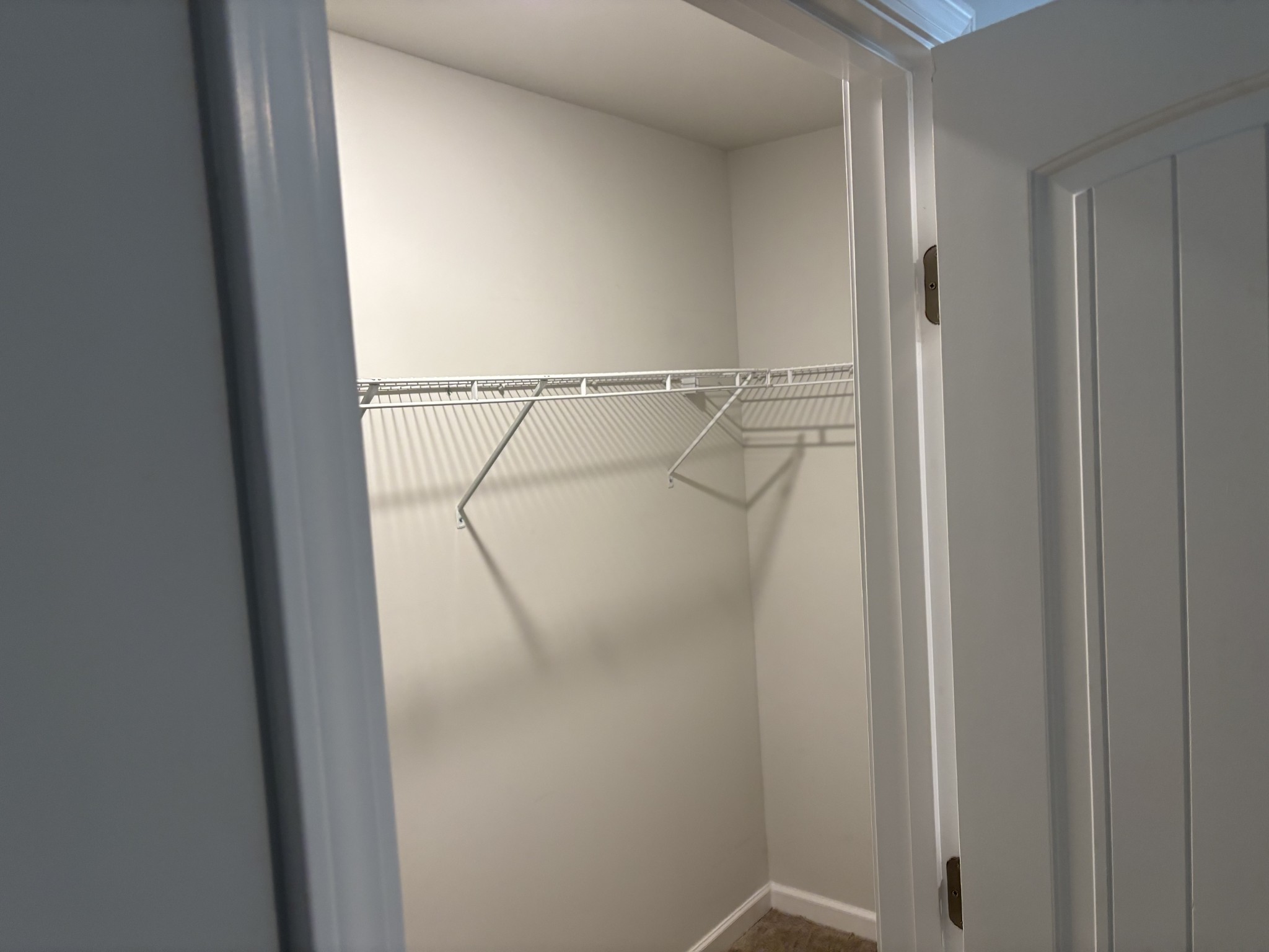 266 Redhead Lane Lebanon, TN 37090 - Photo 16 of 18 a bathroom with a glass shower door