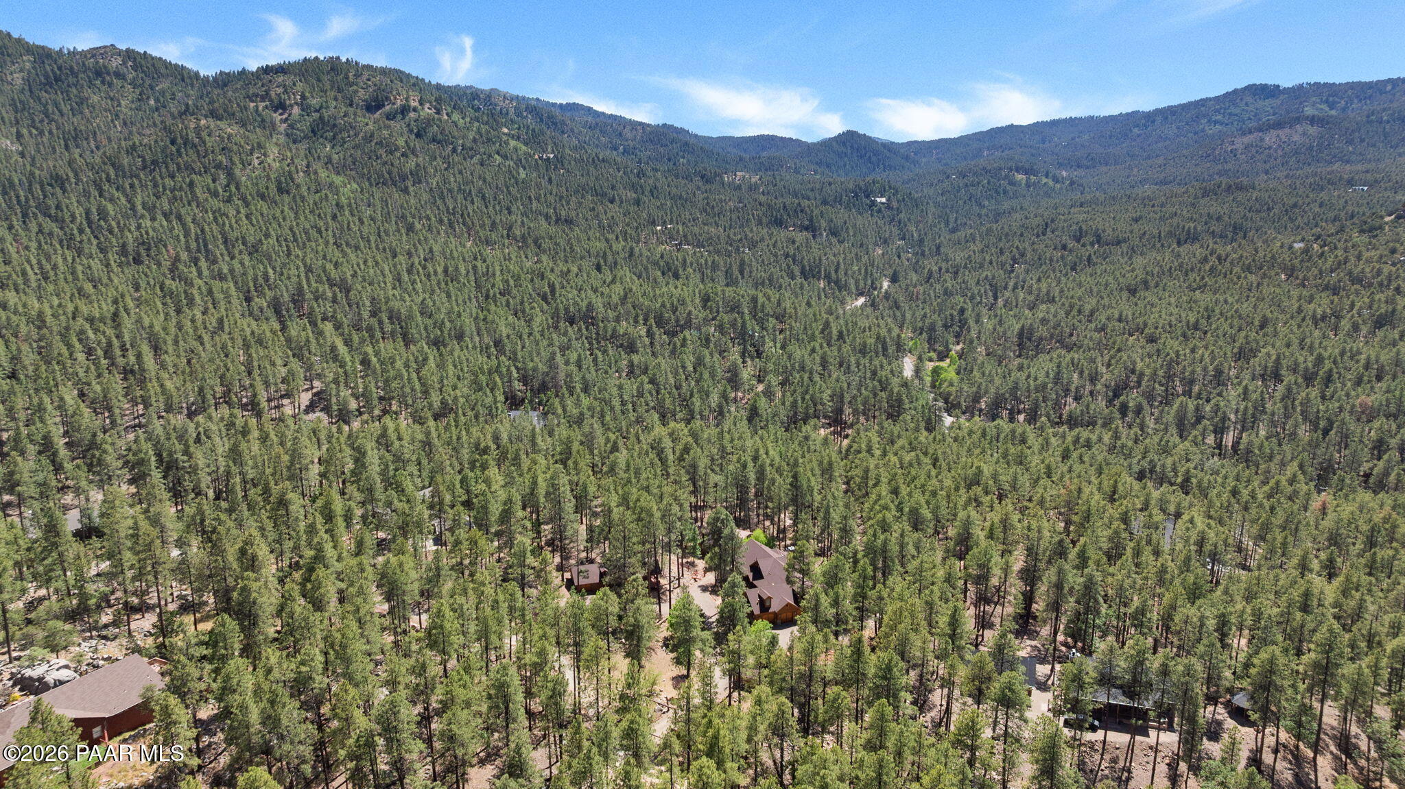 5140 East Charcoal Kiln Road Prescott, AZ 86303 - Photo 136 of 140 a view of a lush green hillside and a mountain