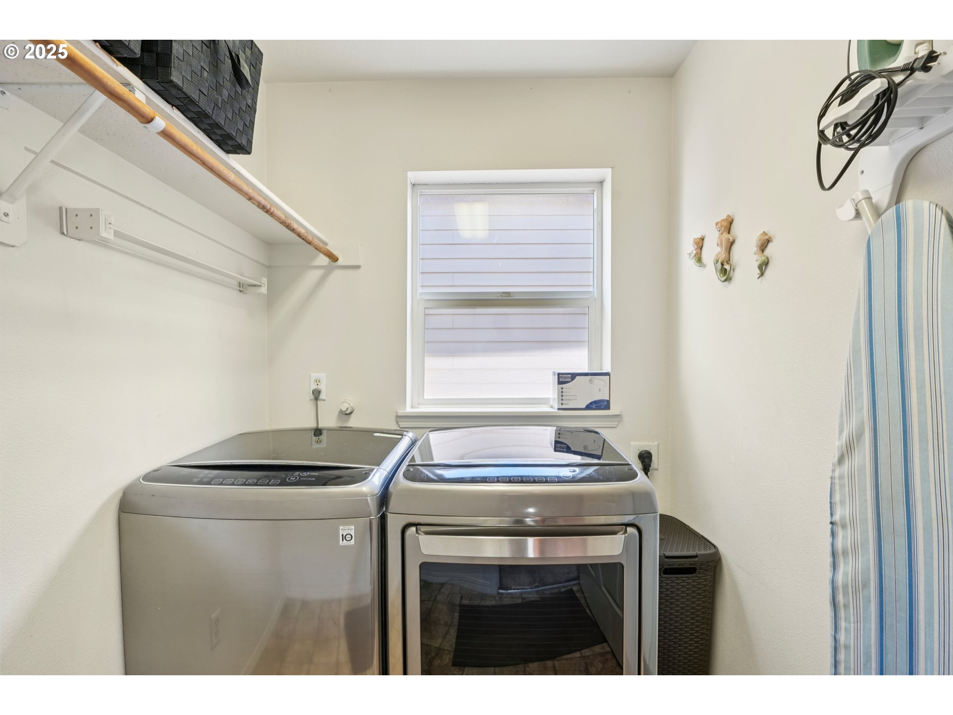20621 Southwest Rosemount Street Beaverton, OR 97078 - Photo 22 of 37 a kitchen with a sink cabinets and a window