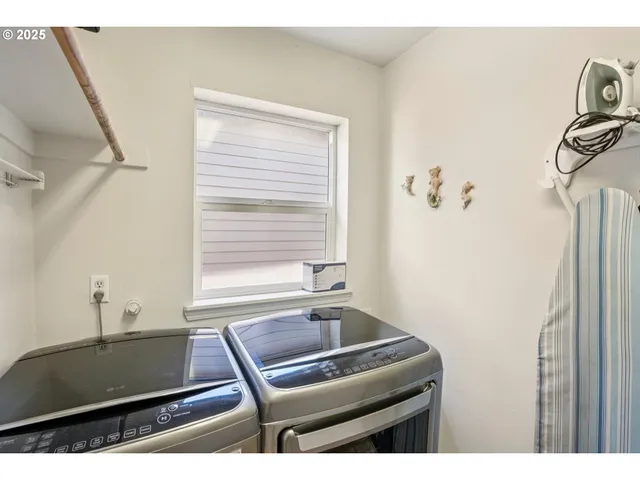a bathroom with a sink and a window