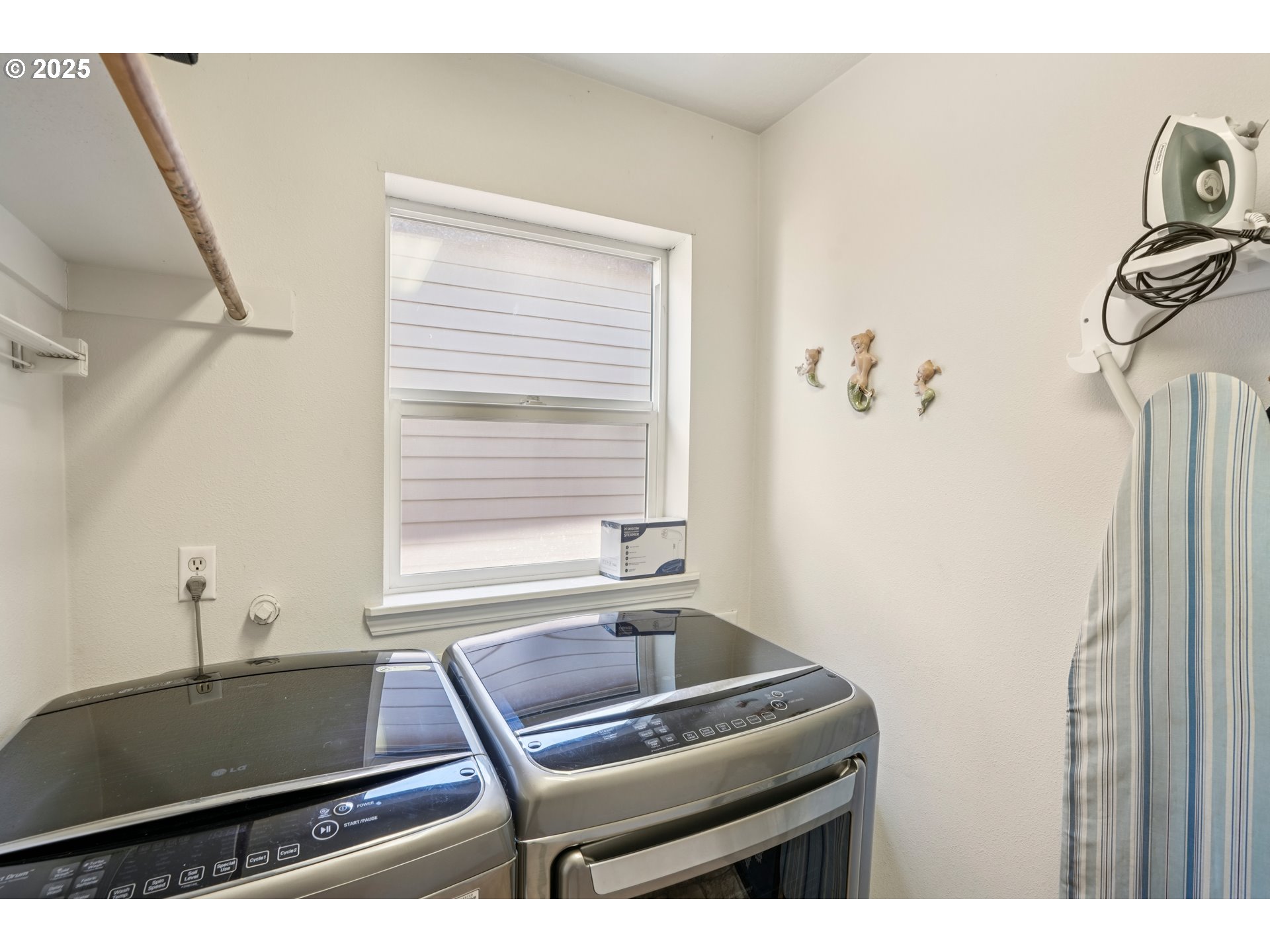 20621 Southwest Rosemount Street Beaverton, OR 97078 - Photo 29 of 37 a bathroom with a sink and a window