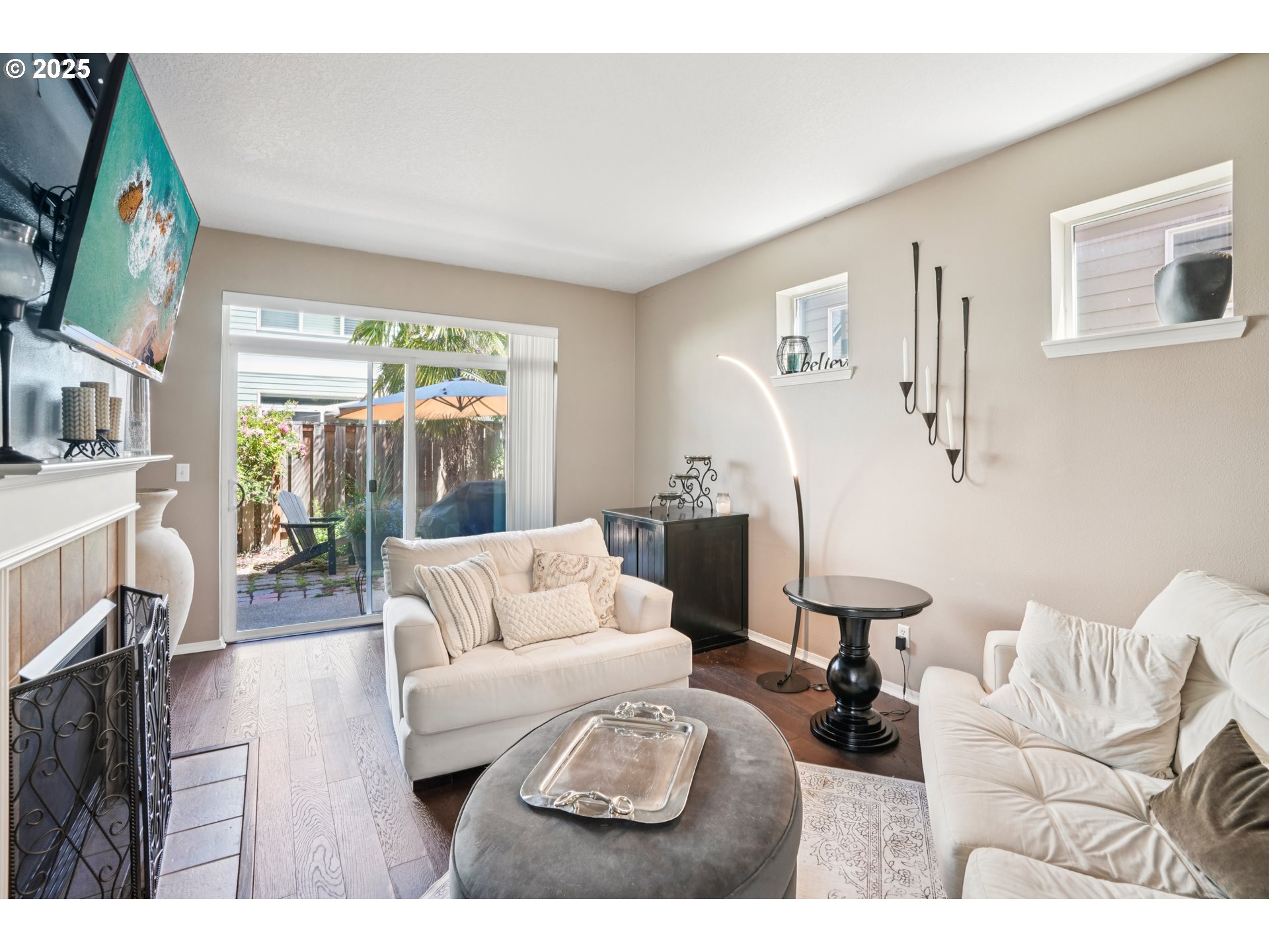 20621 Southwest Rosemount Street Beaverton, OR 97078 - Photo 5 of 37 a living room with furniture and a large window