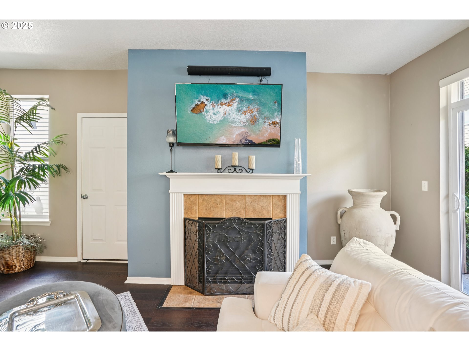 20621 Southwest Rosemount Street Beaverton, OR 97078 - Photo 7 of 37 a bedroom with a bed and a fireplace