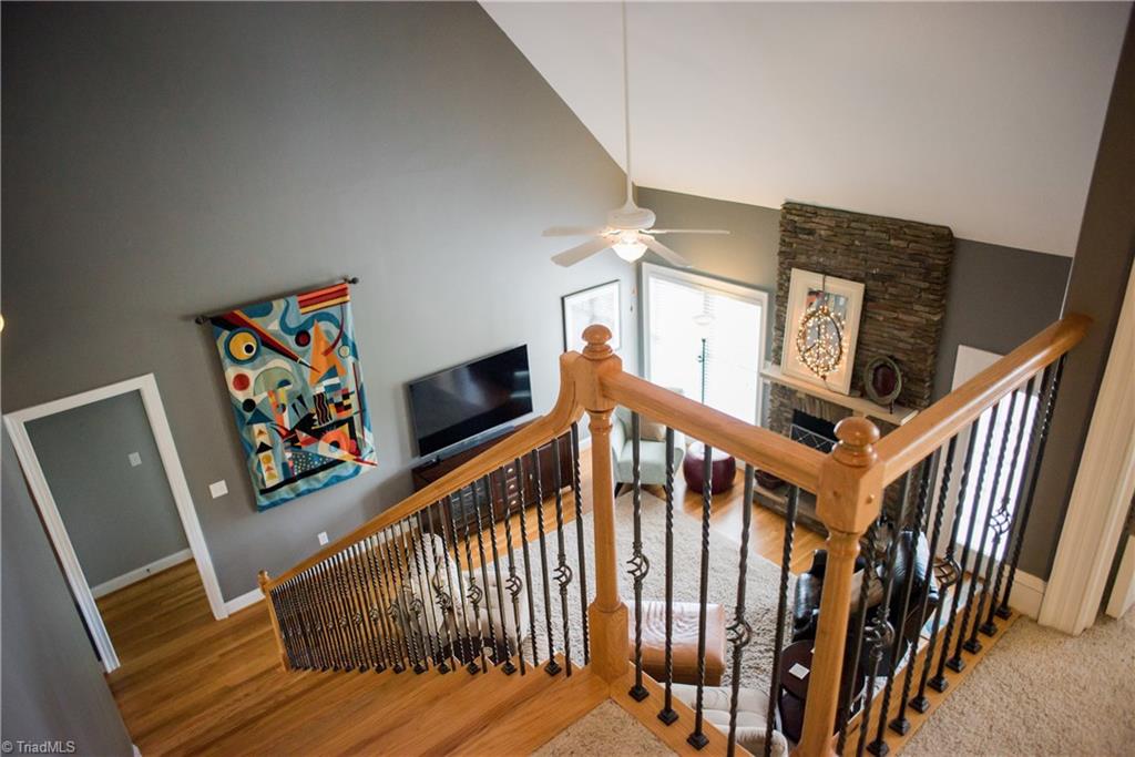 1743 Diercrest Street Oak Ridge, NC 27310 - Photo 19 of 30 View of family room from upstairs landing.