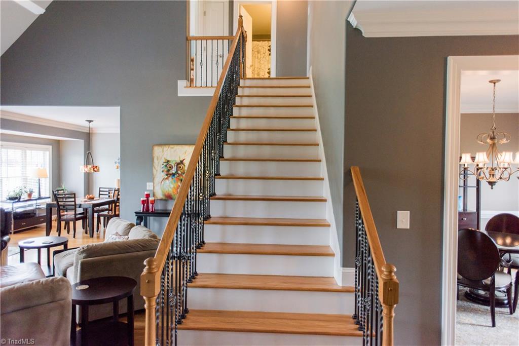 1743 Diercrest Street Oak Ridge, NC 27310 - Photo 3 of 30 Open & airy foyer features a beautiful staircase.