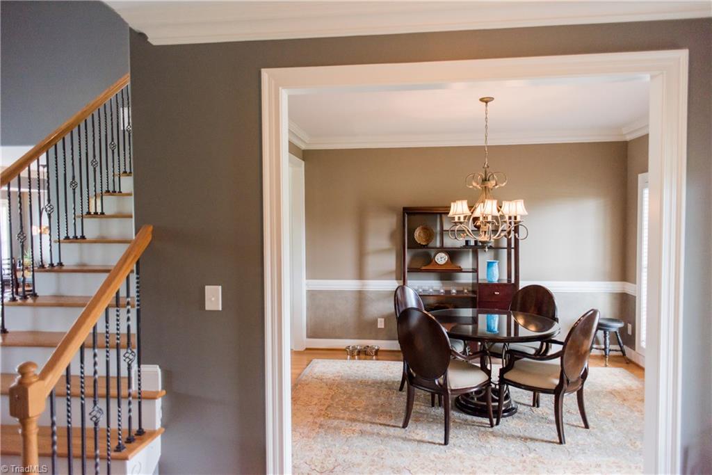 1743 Diercrest Street Oak Ridge, NC 27310 - Photo 5 of 30 Pretty formal dining room features hardwood flooring & elegant moldings.