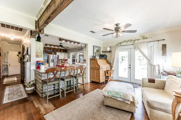 a kitchen with stainless steel appliances granite countertop a stove and a refrigerator