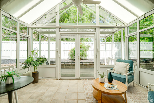 1433 Forge Way Draper, UT 84020 - Photo 13 of 29 Sunroom featuring a vaulted glass ceiling, full-height windows, tiled flooring, and double glass doors opening to the exterior