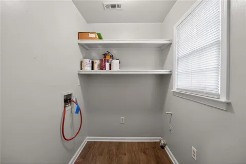 a view of small space with racks on the wall