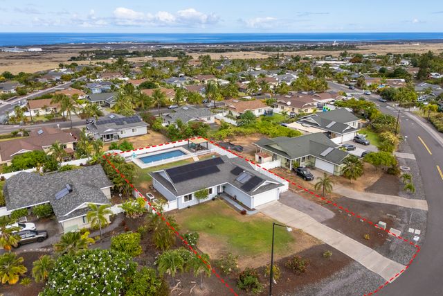 an aerial view of residential building and green space