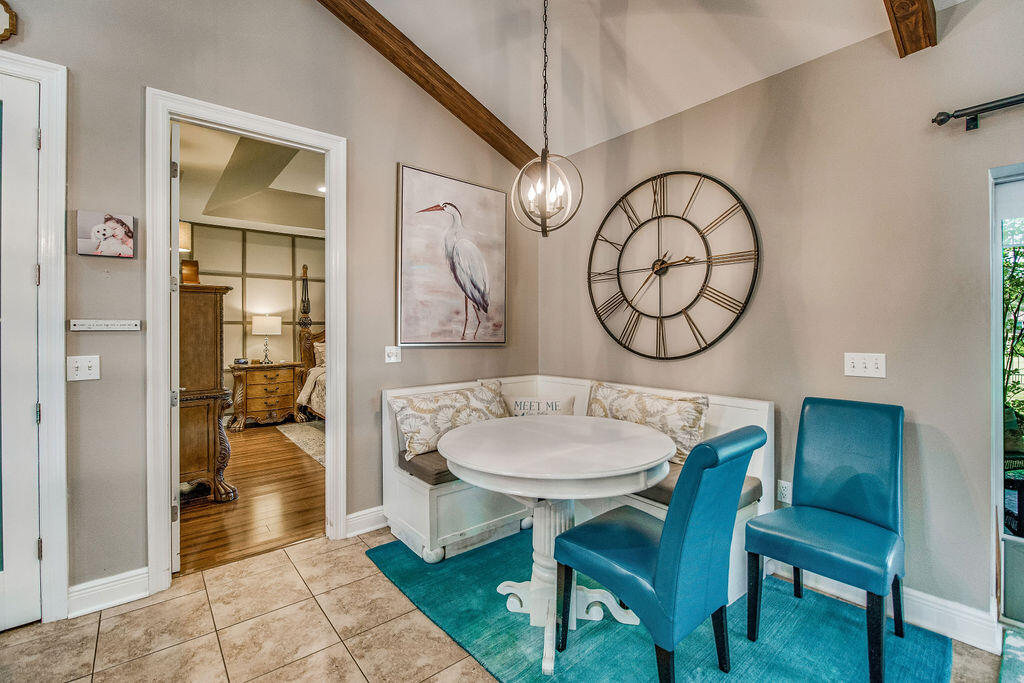 2655 Masters Boulevard Navarre, FL 32566 - Photo 13 of 87 a view of a dining room with furniture window and wooden floor