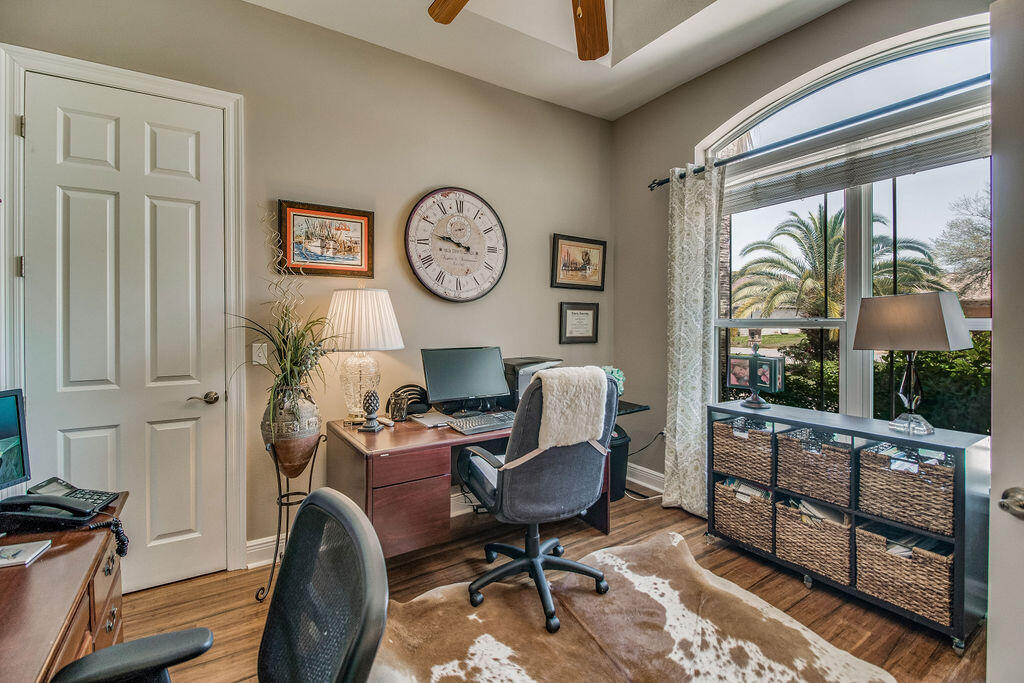 2655 Masters Boulevard Navarre, FL 32566 - Photo 27 of 87 a view of a workspace with furniture and a window