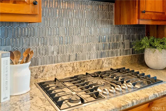a spacious bathroom with a granite countertop tub sink and mirror