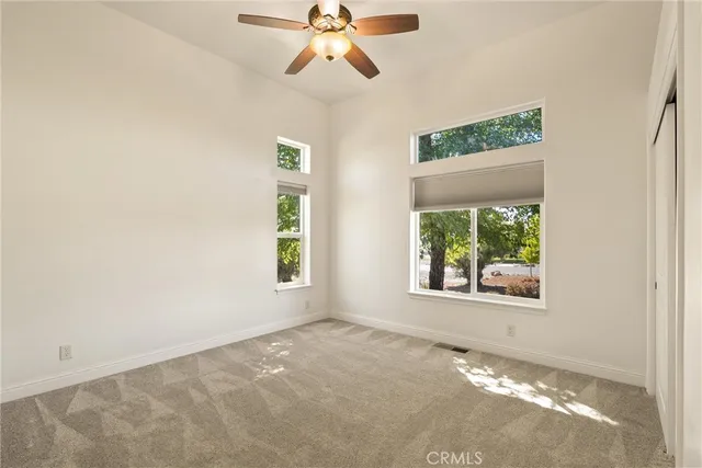a view of swimming pool with a yard and sitting area