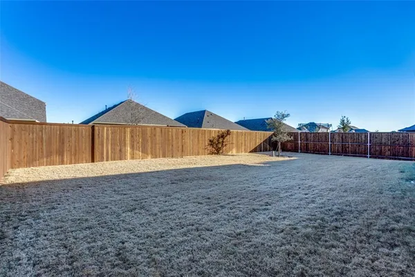 a vase of flowers sitting on a table
