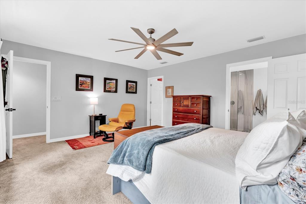 2 Bulow's Landing Flagler Beach, FL 32136 - Photo 18 of 42 a bedroom with a bed couch and a window