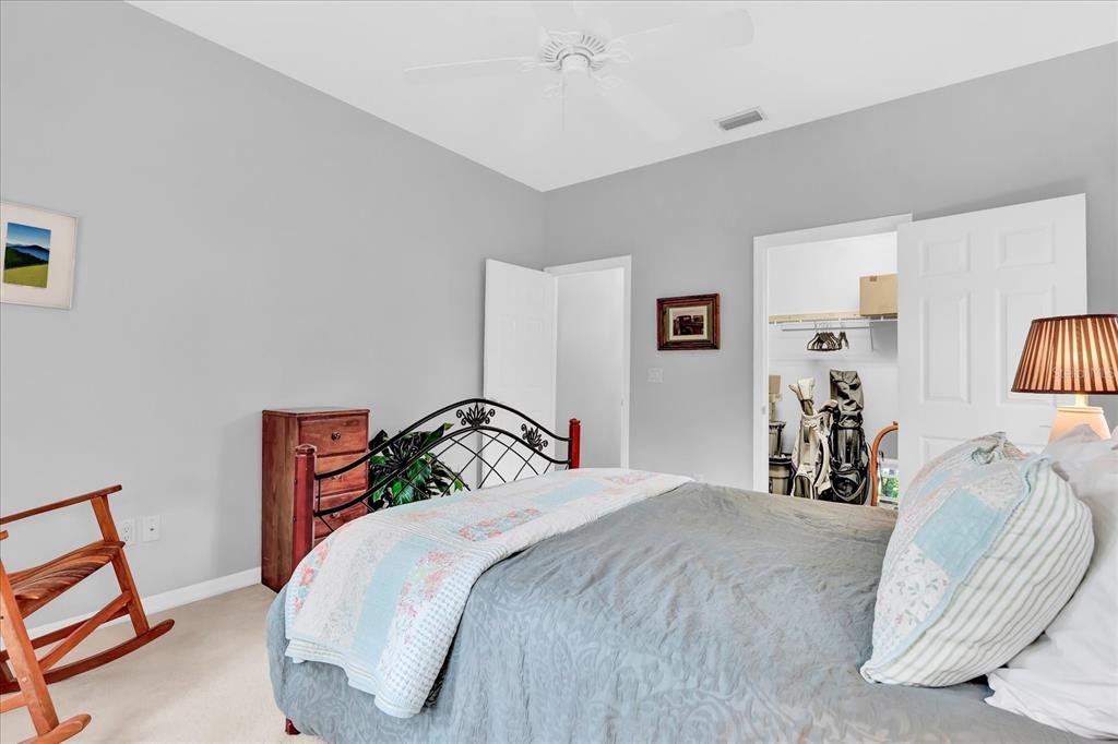 2 Bulow's Landing Flagler Beach, FL 32136 - Photo 26 of 42 a bedroom with a bed and wooden floor