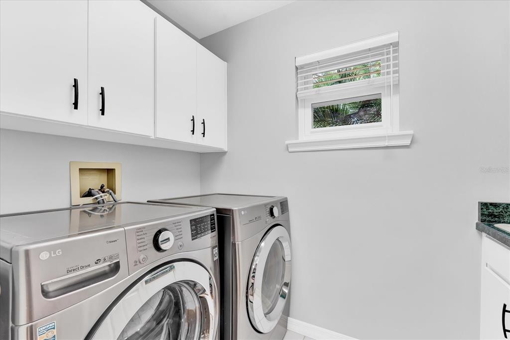 2 Bulow's Landing Flagler Beach, FL 32136 - Photo 27 of 42 a utility room with dryer and washer