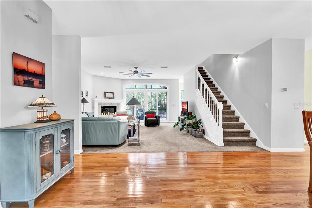 2 Bulow's Landing Flagler Beach, FL 32136 - Photo 3 of 42 a living room with furniture and stairs