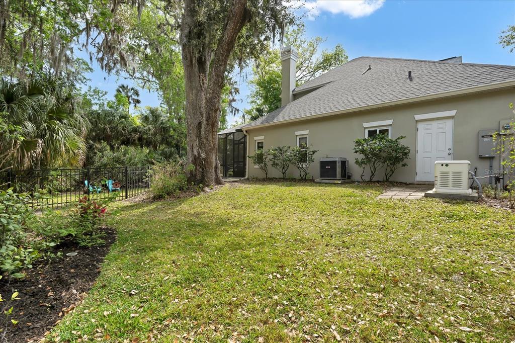 2 Bulow's Landing Flagler Beach, FL 32136 - Photo 41 of 42 a view of a house with backyard and tree