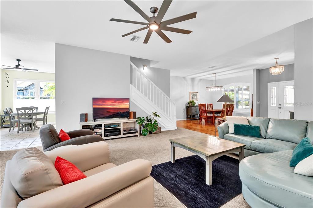 2 Bulow's Landing Flagler Beach, FL 32136 - Photo 6 of 42 a living room with furniture a rug potted plant and a window