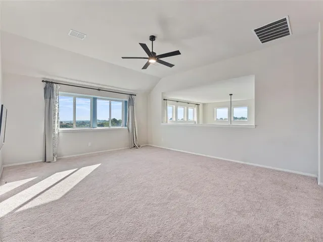 a view of storage and utility room with washer and dryer