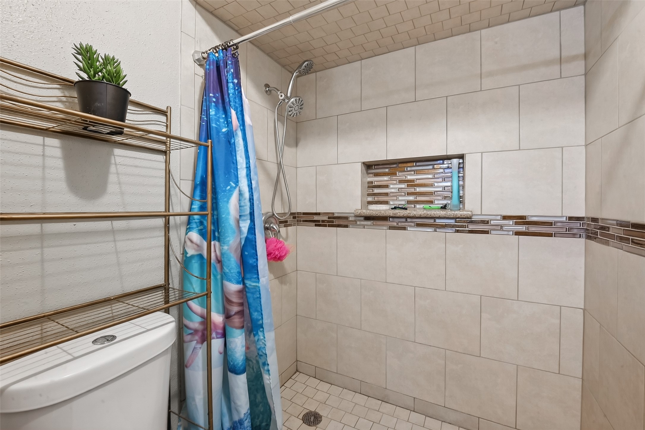 621 Elsbeth Road Channelview, TX 77530 - Photo 23 of 38 a bathroom with a shower and a sink