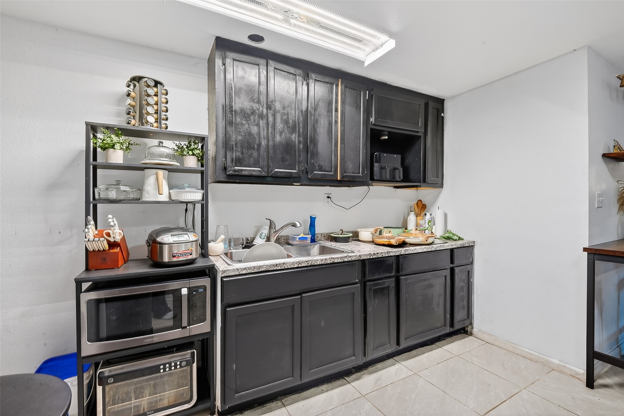 621 Elsbeth Road Channelview, TX 77530 - Photo 28 of 38 a kitchen with stainless steel appliances a stove and a sink