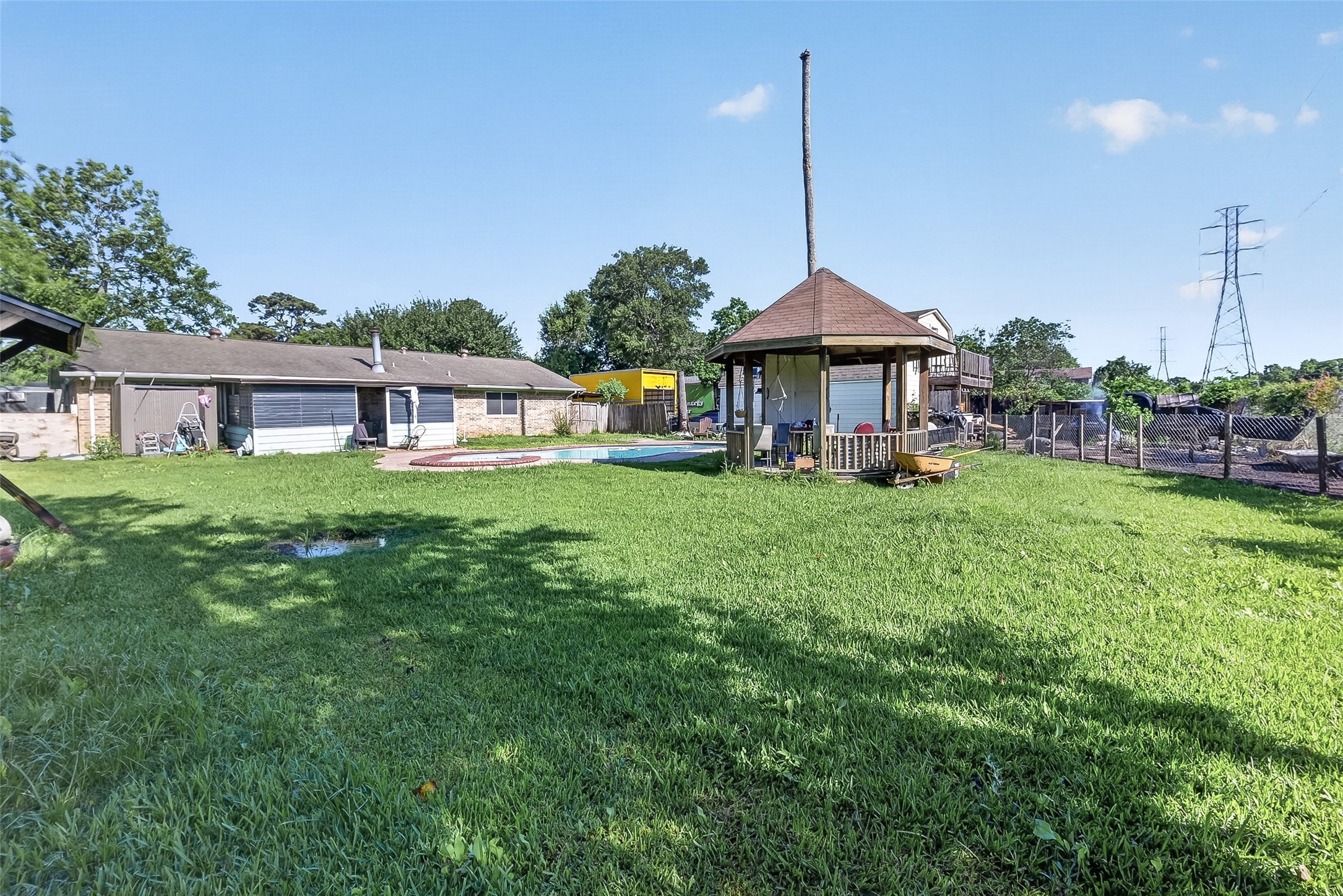 621 Elsbeth Road Channelview, TX 77530 - Photo 37 of 38 a view of a house with a big yard and potted plants