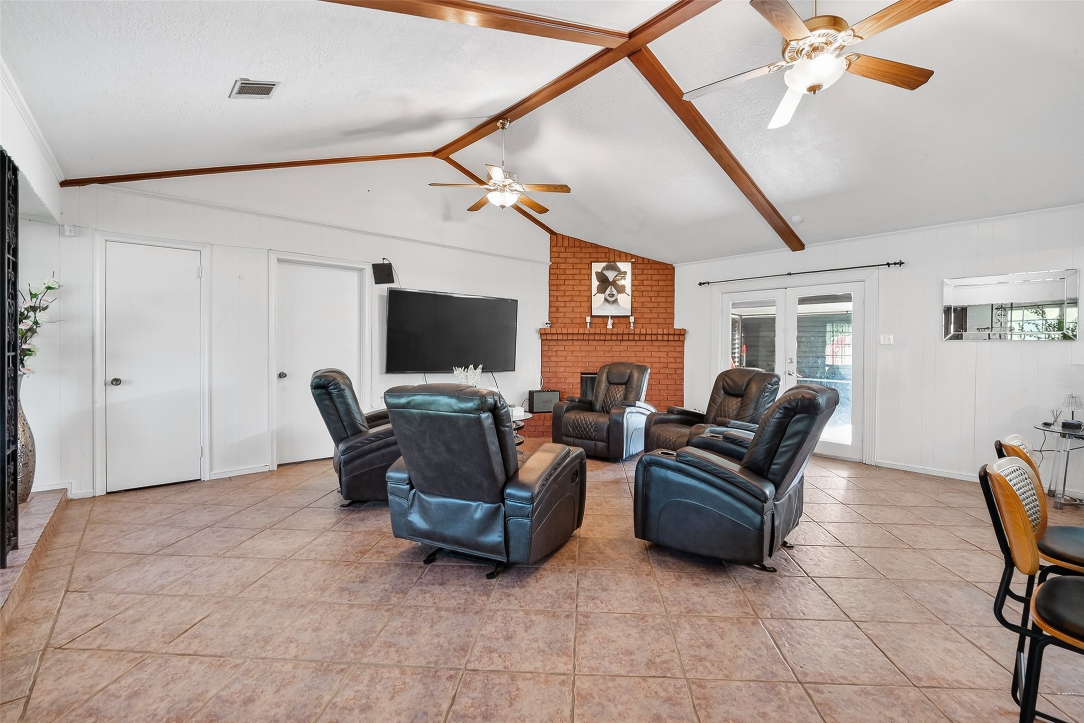621 Elsbeth Road Channelview, TX 77530 - Photo 7 of 38 a living room with furniture and a flat screen tv