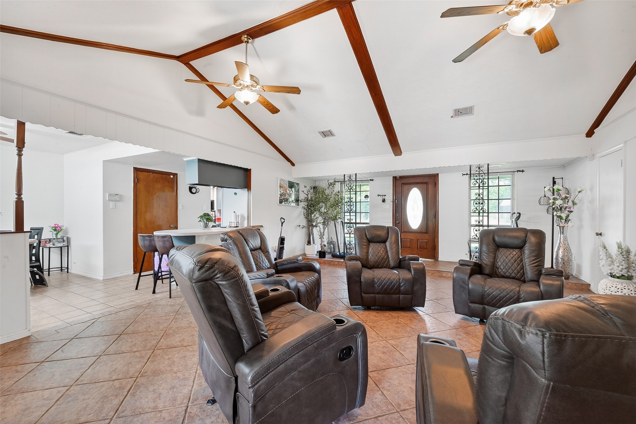 621 Elsbeth Road Channelview, TX 77530 - Photo 9 of 38 a living room with furniture a ceiling fan and a rug