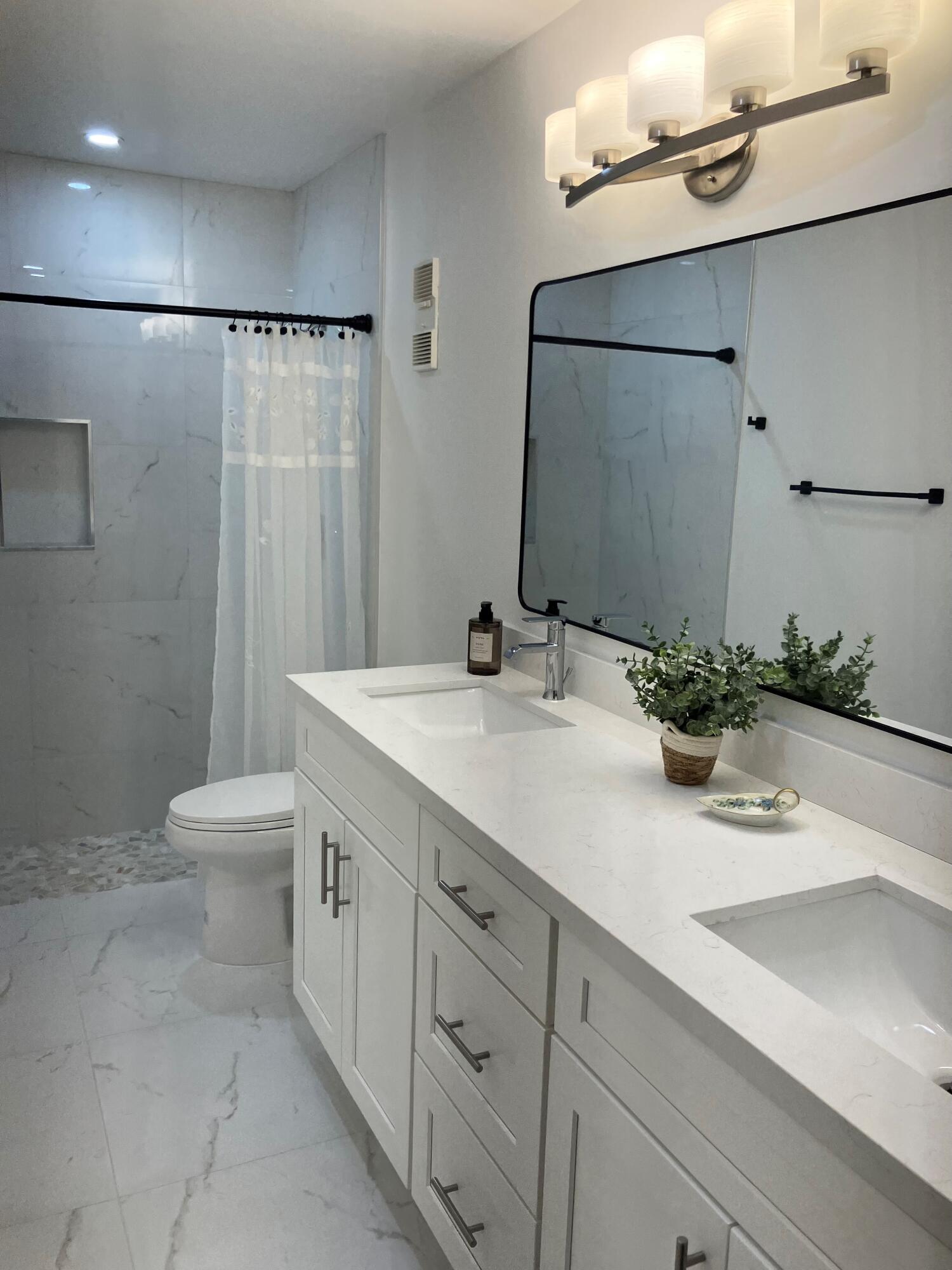 8273 Springtree Road Boca Raton, FL 33496 - Photo 6 of 37 Eastgate master bathroom 1